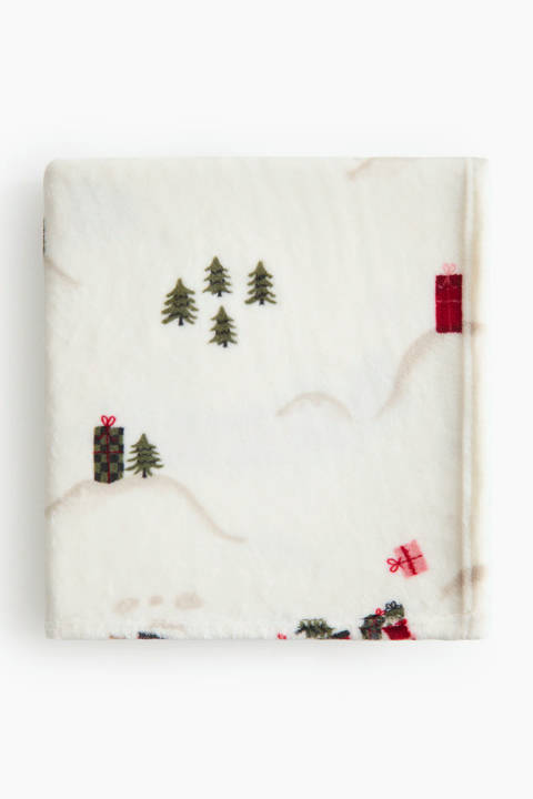 H&M Home — Plaid en tissu polaire à motif
