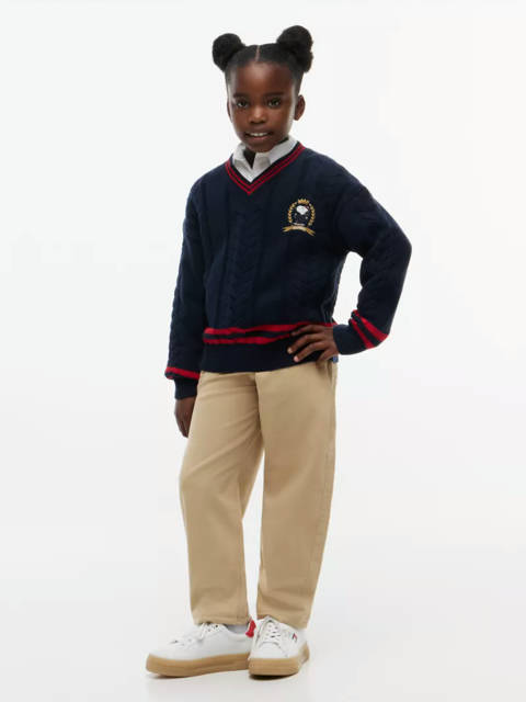 Tommy Hilfiger — Pull en maille torsadée Peanuts® à blason